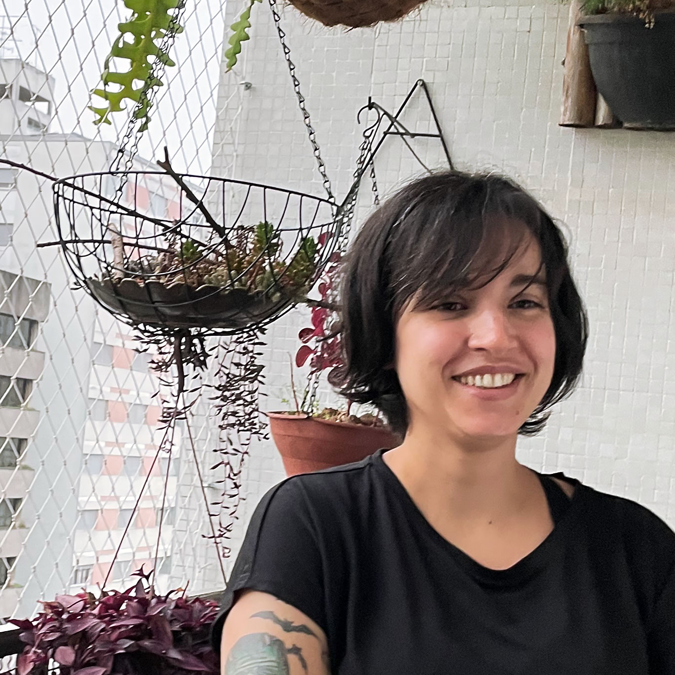 woman with short hair smiling